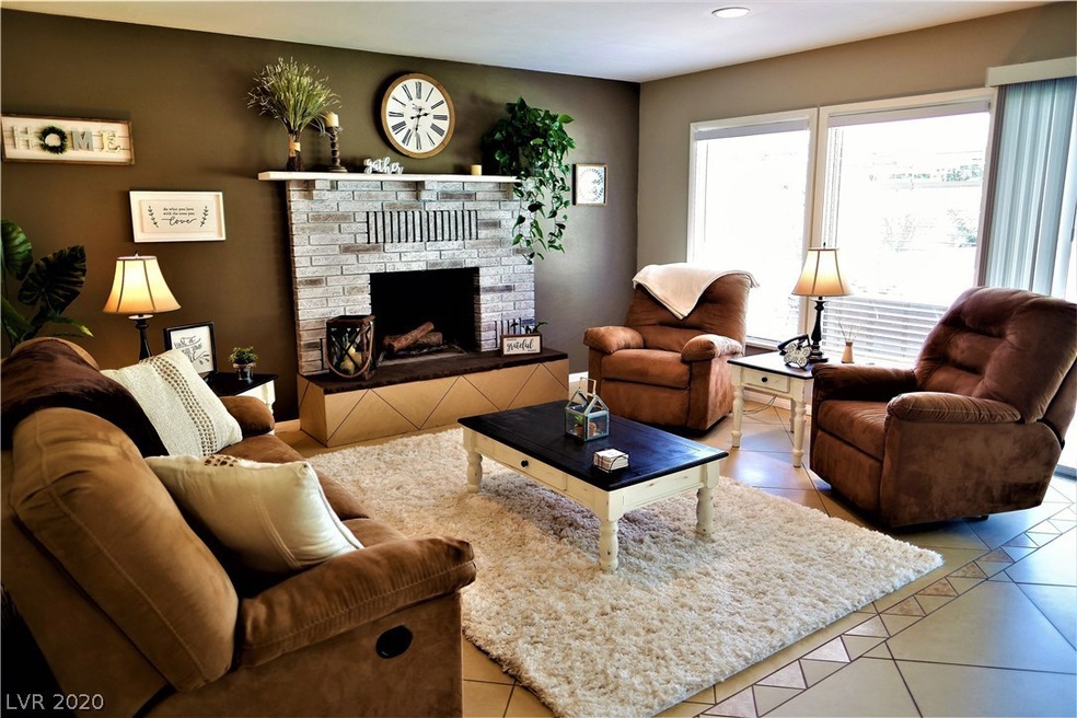 LIVING ROOM W/ WOOD BURNING FIREPLACE