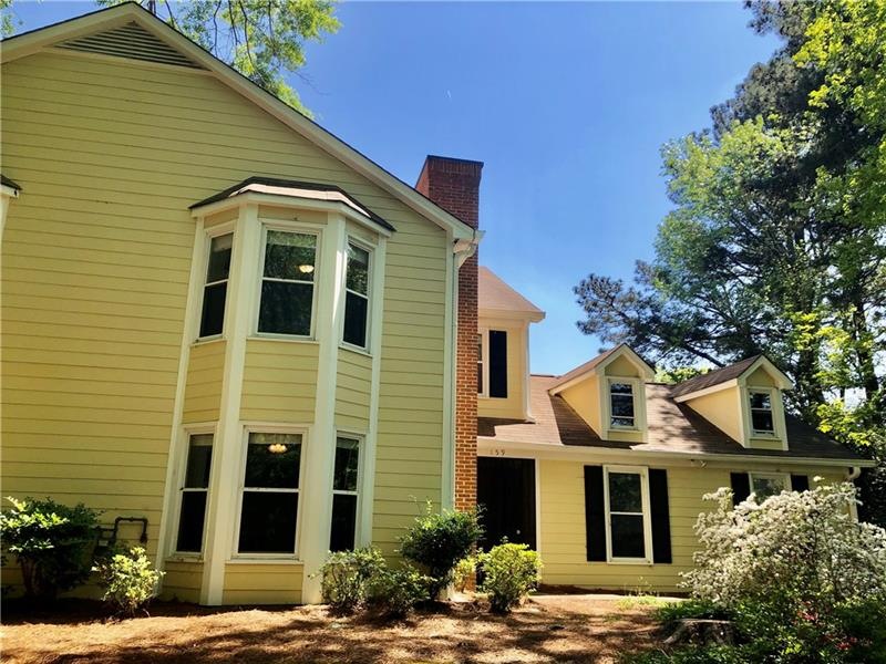 Private condo on back side of 4 unit building with