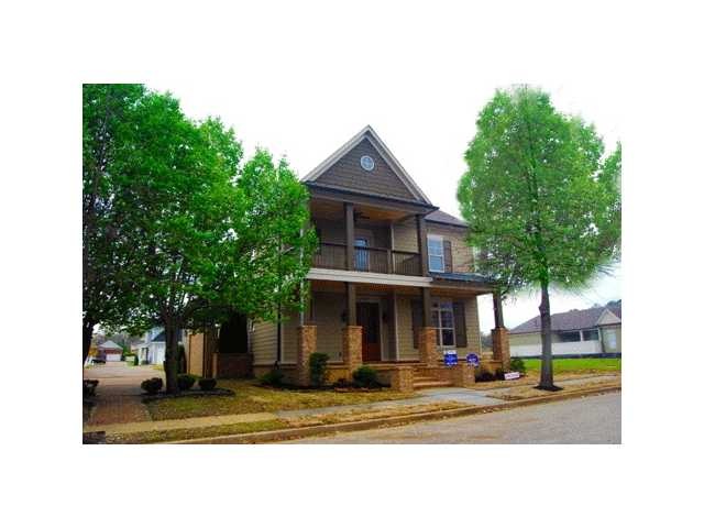 Enjoy the large covered front porch and covered ba