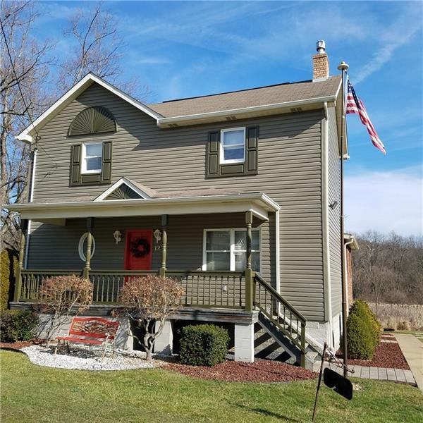 GREAT CURB APPEAL! LOVELY FRONT PORCH AND PRETTY L