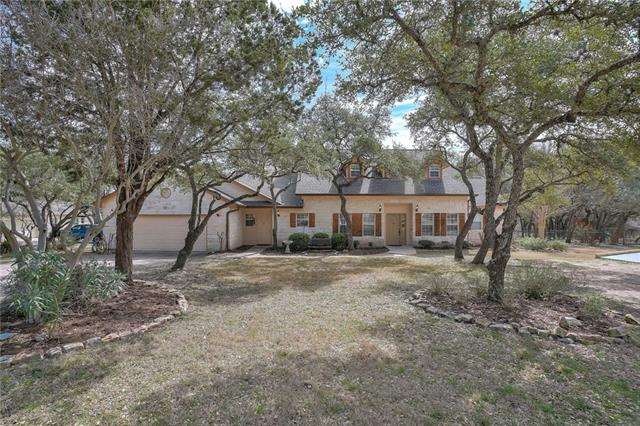 Large trees on a 1.6 acre lot add shade and beauty to the property.