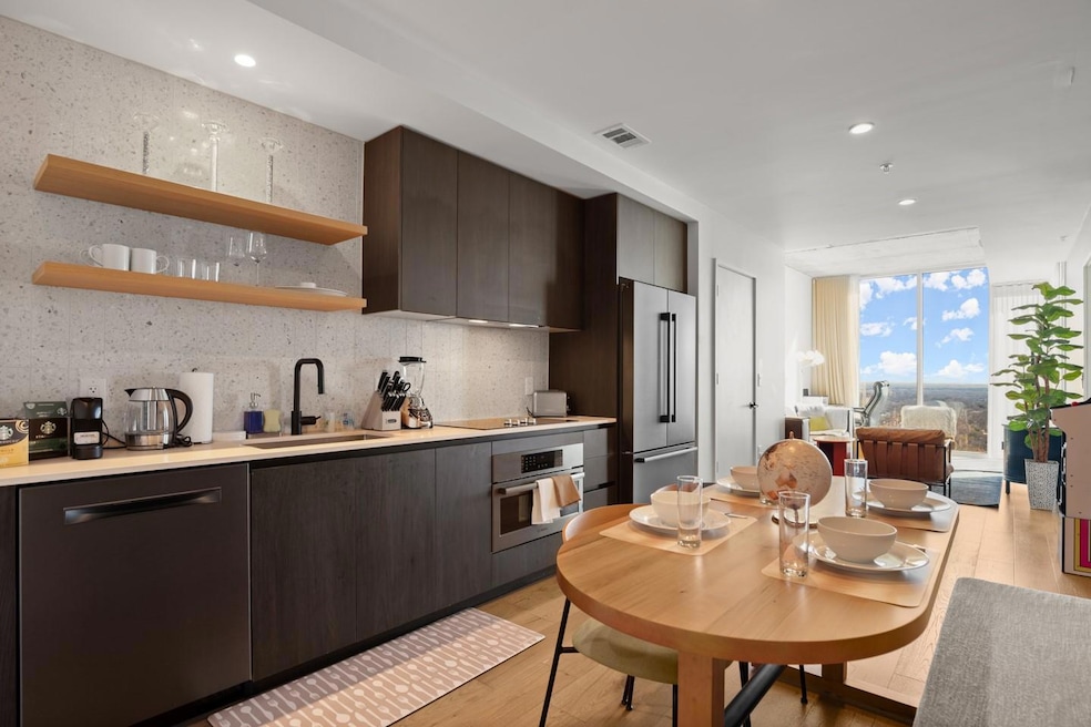 Kitchen featuring appliances with stainless steel