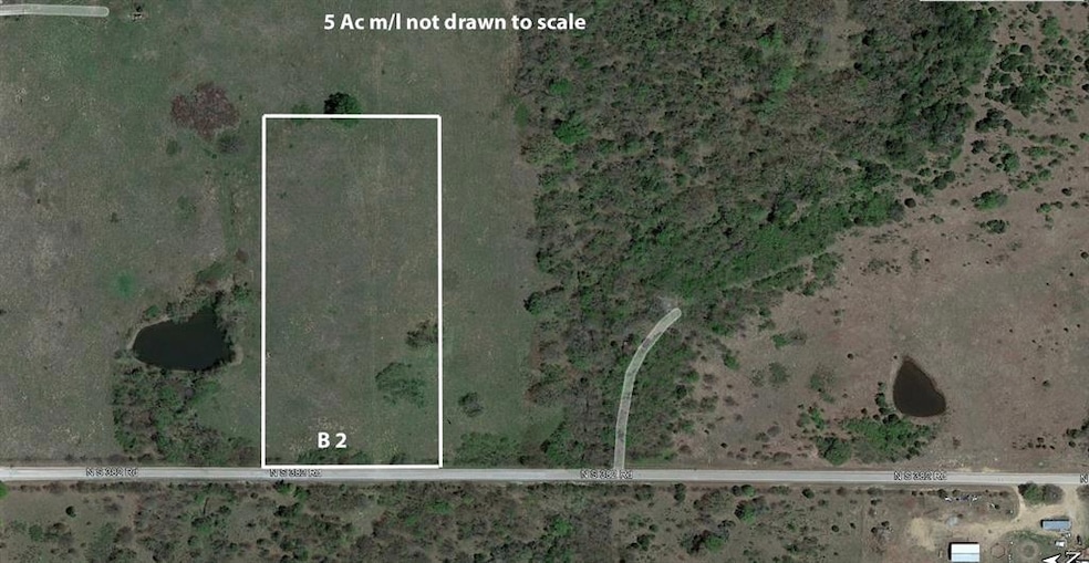 Aerial map of property and surrounding area featur