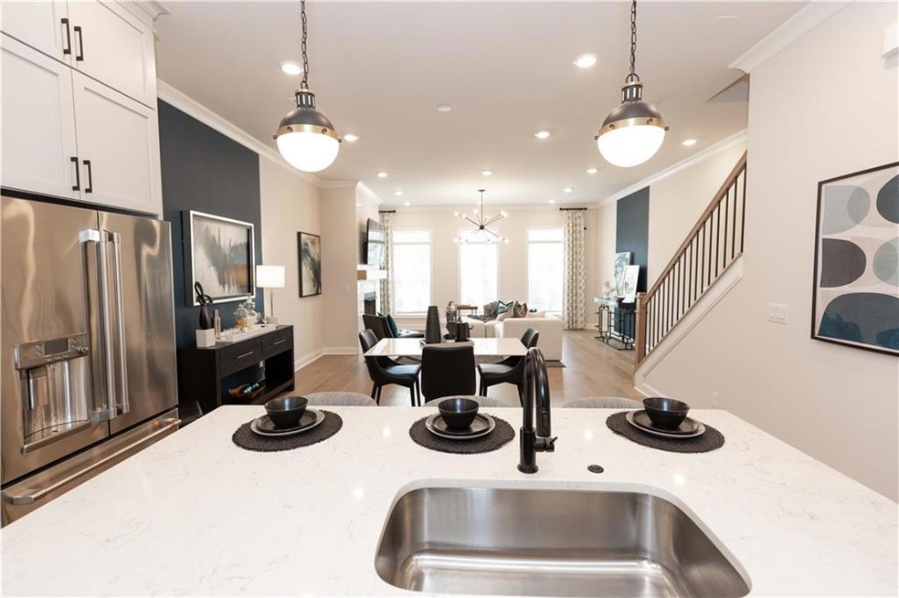 Quartz countertops, along with designer fixtures, 