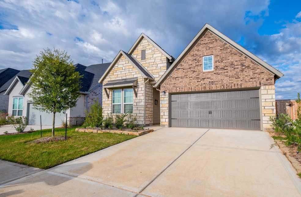 24643 Carleton Lake Ln, the Woodlands, TX 77375 - photo 1