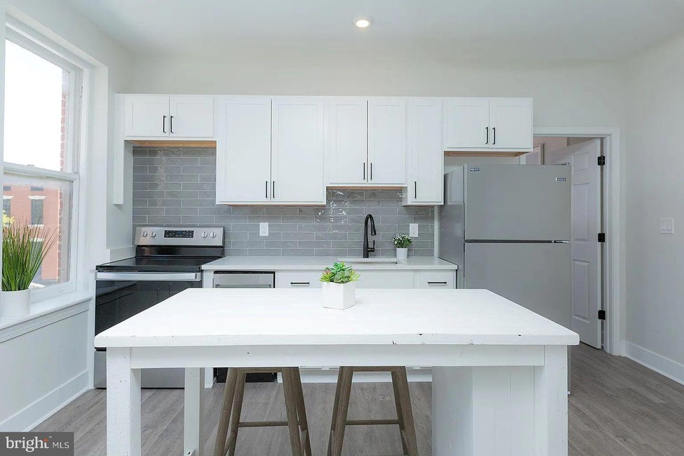 1122 N Calvert St unit 205, Baltimore, MD 21202 - photo 1