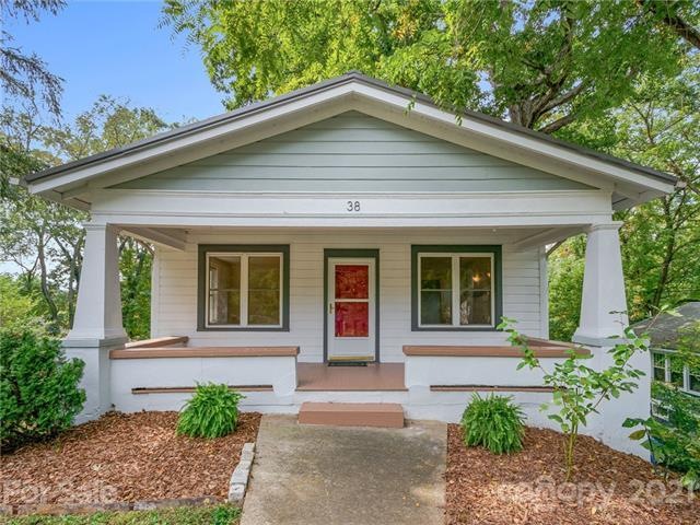 Charming 1920s bungalow with covered porch.