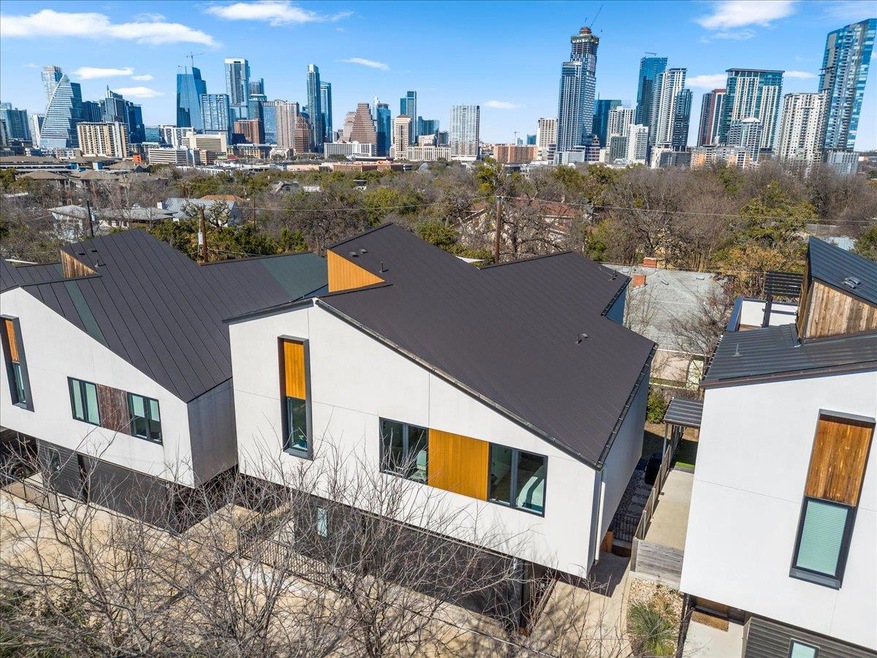 Birds eye view of property with a view of city