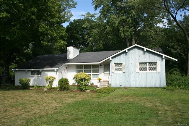 Spectacular custom built ranch on over a half acre lot!