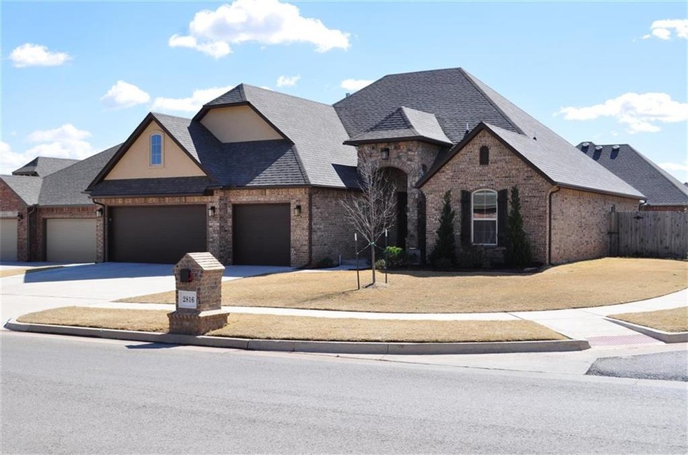Front  This custom built home has it all. Hardwood