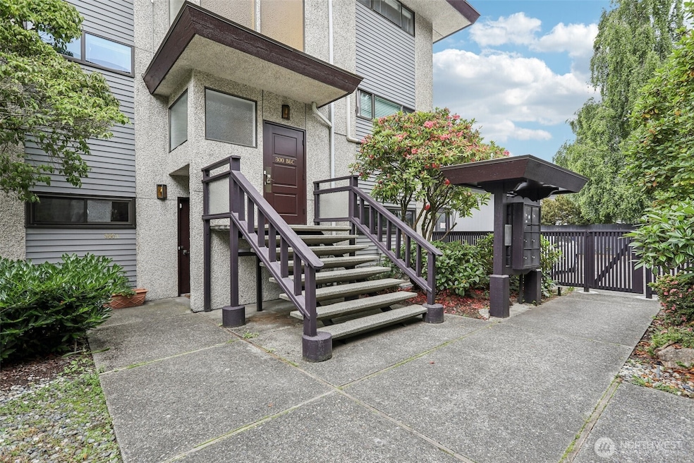 Welcome Home! Entrance from Street and Community Courtyard with Mailboxes nearby.