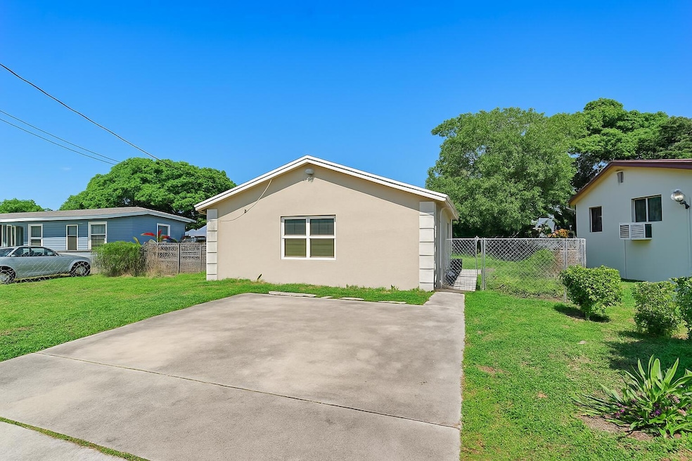 1340 W 35th St, Riviera Beach, FL 33404 - photo 1