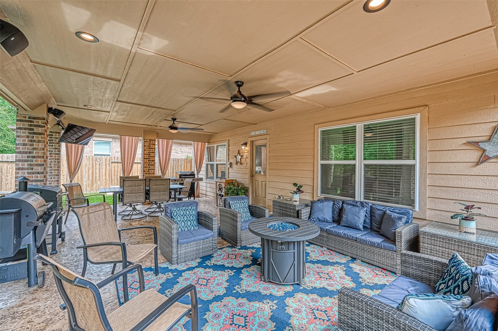 This covered patio is to die for gorgeous!

This covered patio is worth buying this gorgeous home.