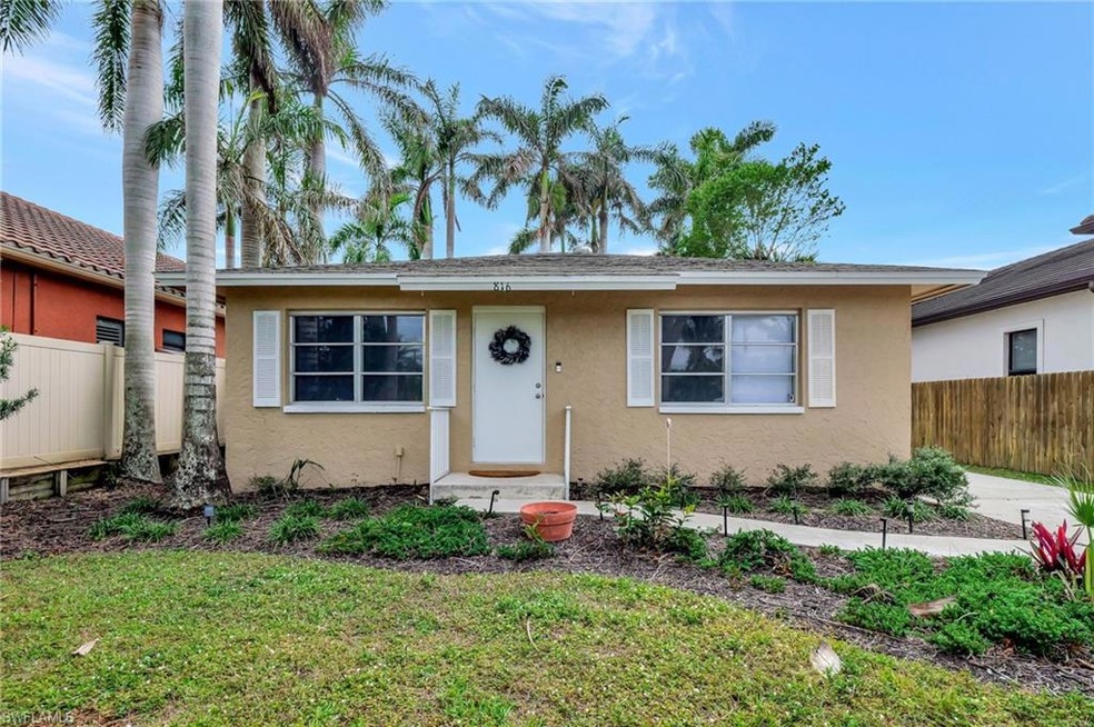 View of front of property with a front lawn