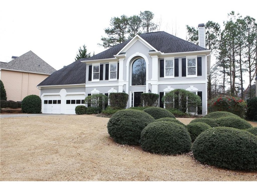 Stunning European home is on level lot with profes