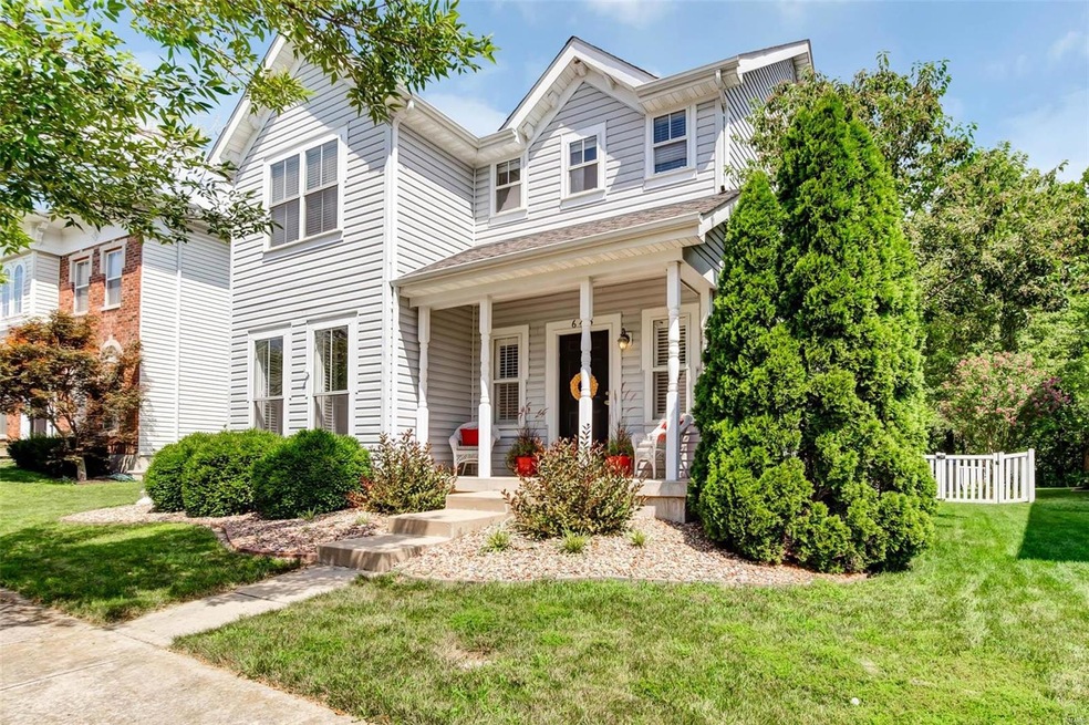 Enjoy your front porch in this lovely 2 story loca