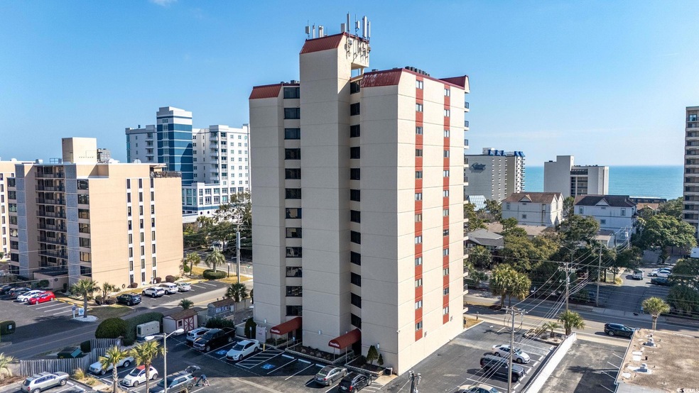 View of building exterior featuring a water view