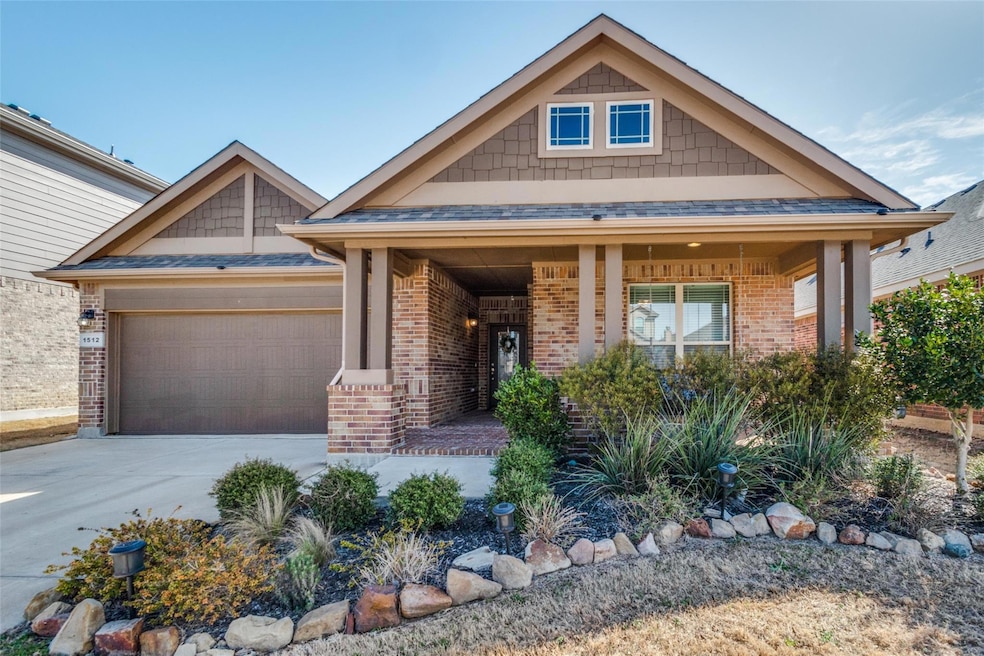 Craftsman house with covered porch, concrete drive