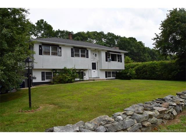 Front Yard is lined with a stone wall