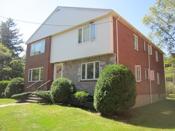 115 Langley Rd unit 117, Newton Center, MA 02459 - photo 1