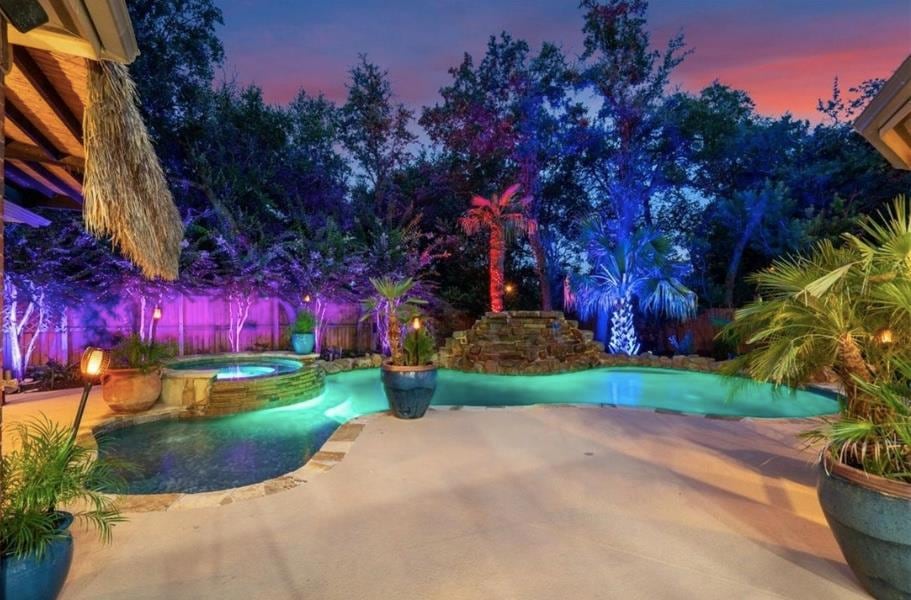 View of pool with a patio area and a pool with co