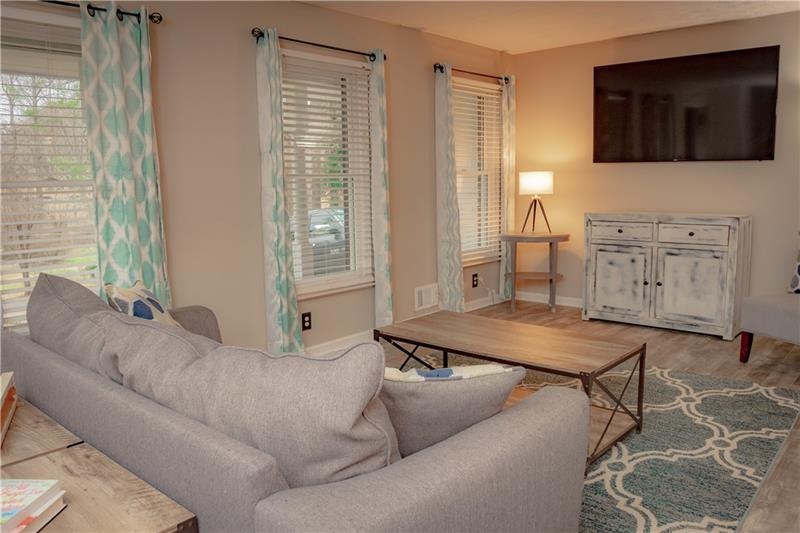 Open concept, all new floors, gorgeous new windows