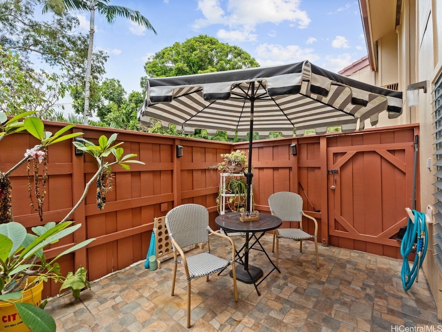 Spacious and private fully fenced ground floor patio space facing trees and not other neighbors.