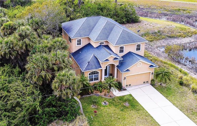 Aerial shot of this lovely home. Private, vacant l