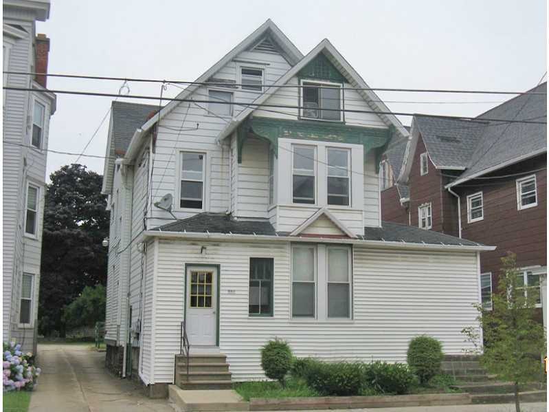 Exterior Front. Private parking lot behind buildin