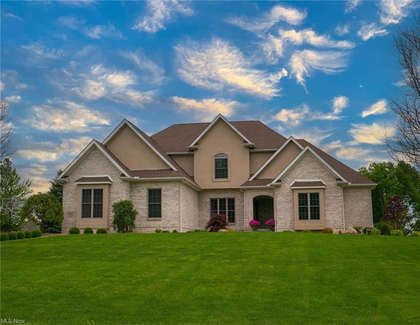 Beautiful home sits high making it look majestic. 