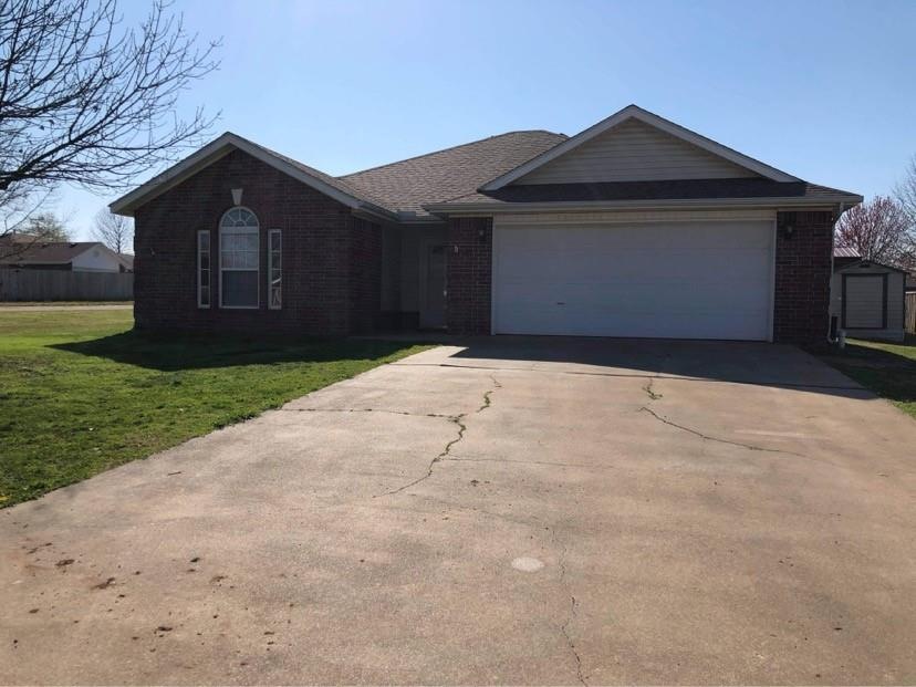 Front of the house; storage building conveys also,