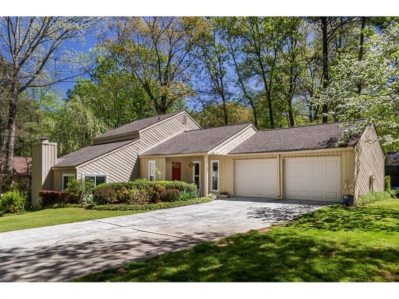 This contemporary ranch and a half is perched at t
