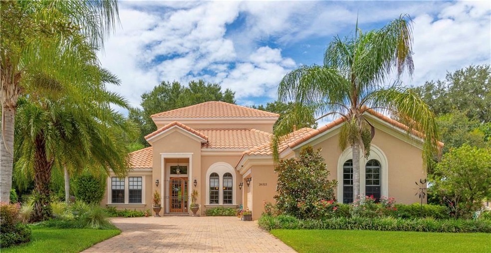 Stunning 2693 SF Spanish Mediterranean style home.  Features 5B/3B/Pool/2 1/2 car garage on a large private lot.