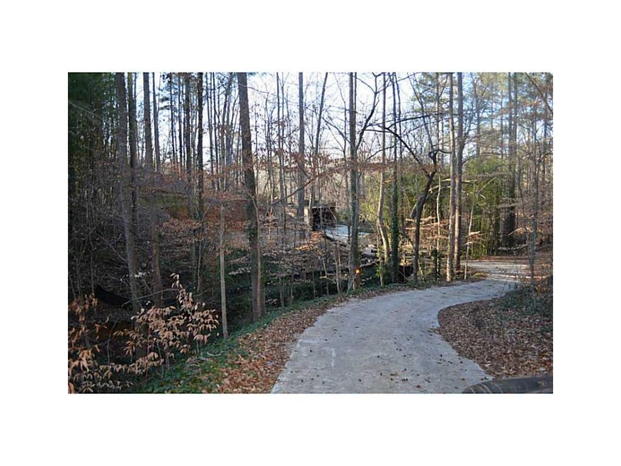 Exterior Front. Halfway up driveway-lot is on othe