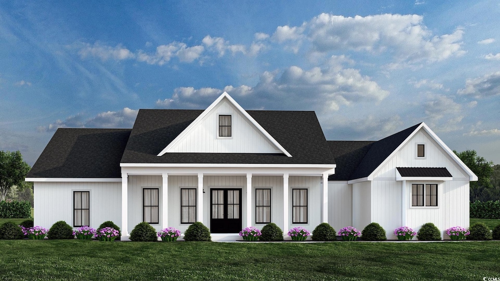 View of front of house with a front yard and cover