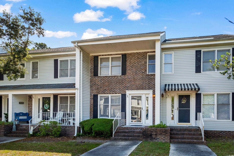 Multi unit property featuring covered porch