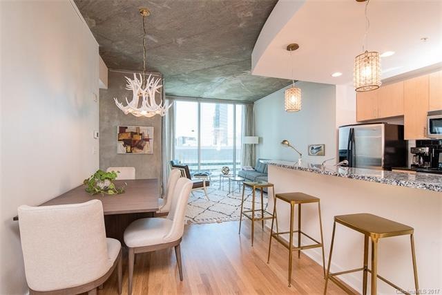 Beautiful sun filled open kitchen and dining