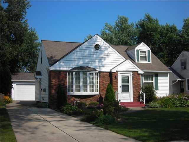 Exterior Front Brick and sided cape, all new windo