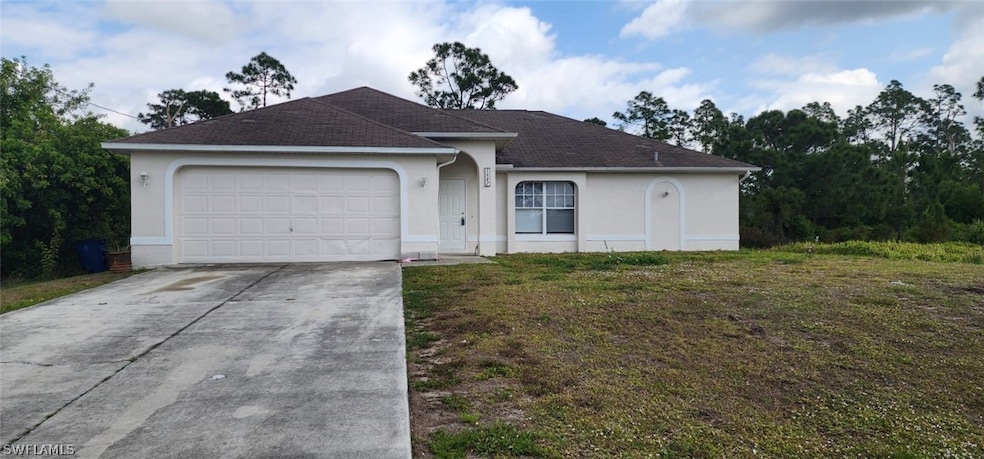 1027 Hatfield St, Lehigh Acres, FL 33974 - photo 1