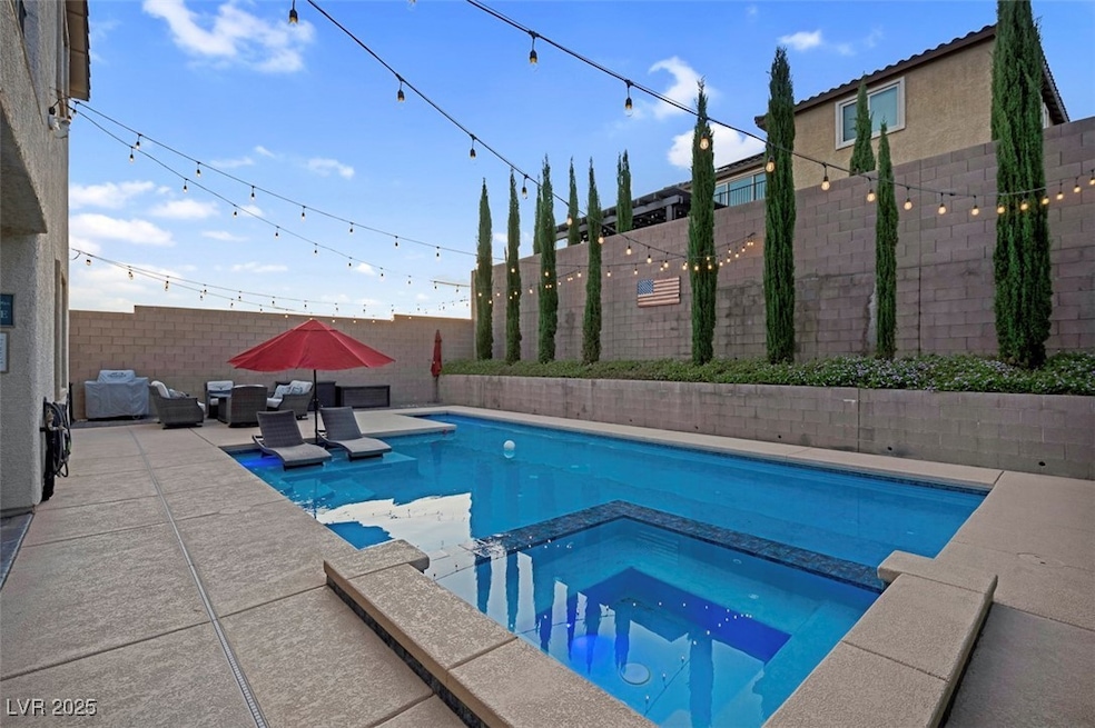 View of pool featuring a fenced backyard, a patio,