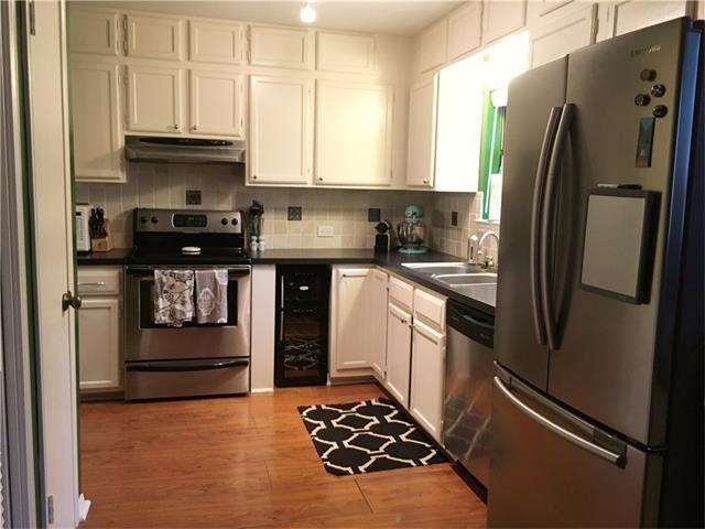 Spacious, light filled kitchen with stainless appl