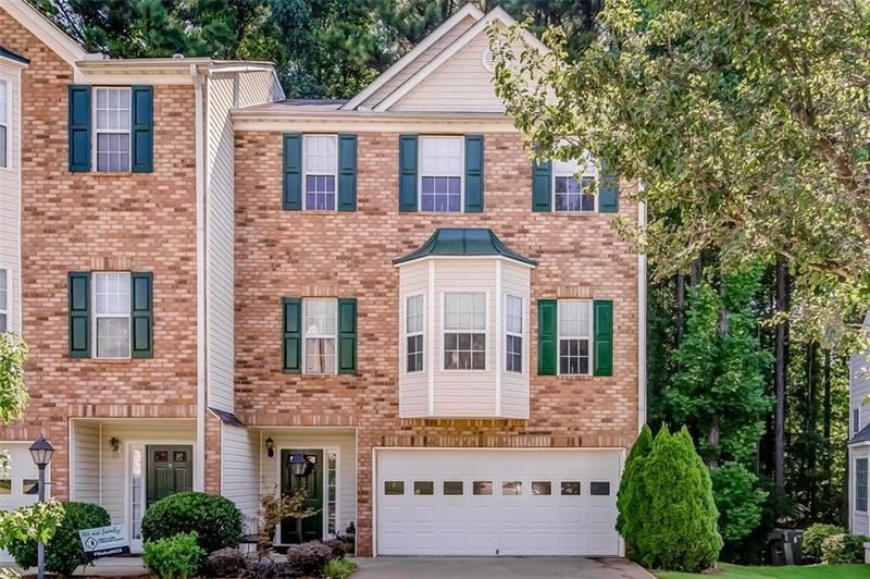 Beautiful Brick Front Townhome with 2 Car Garage