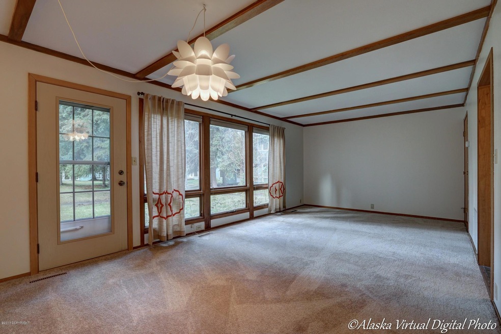 Open living room with courtyard access
