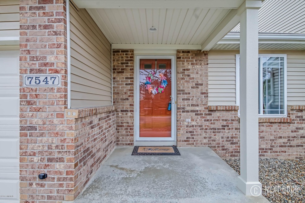 7547 Navajo Valley Dr SW unit 23, Byron Center, MI 49315 - photo 1