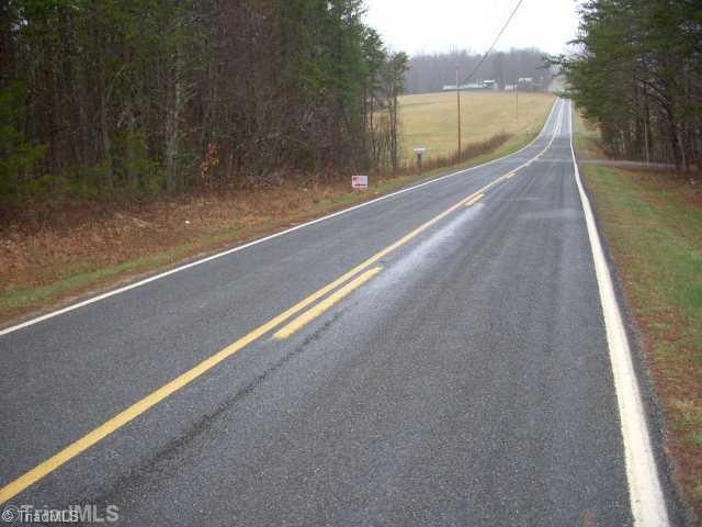 Land. The 3 acres is the wooded area on the left.  There is 233 feet of road frontage. A nice rural tract of land.