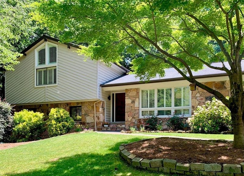 LOVINGLY UPDATED AND MAINTAINED HOME WITH 5 BEDROO