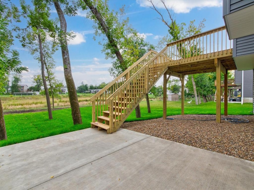 Enjoy nature from the deck or patio lot backs up t