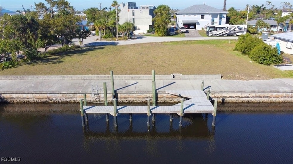 View from water towards property and dock