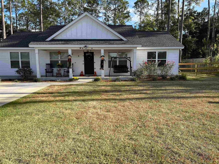 97 Allen Harvey St, Crawfordville, FL 32327 - photo 1