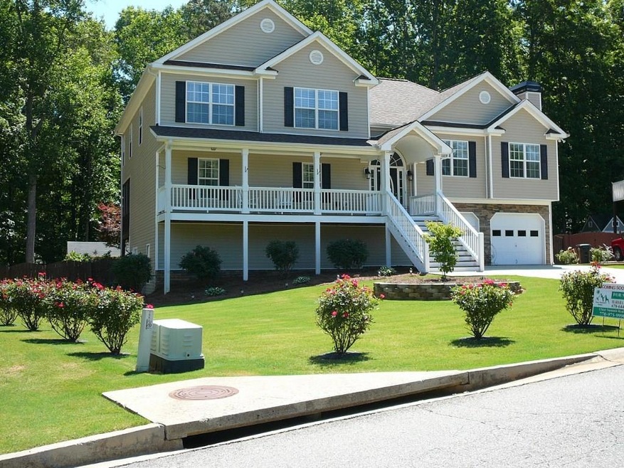 Front of Home with lovely Landscaping